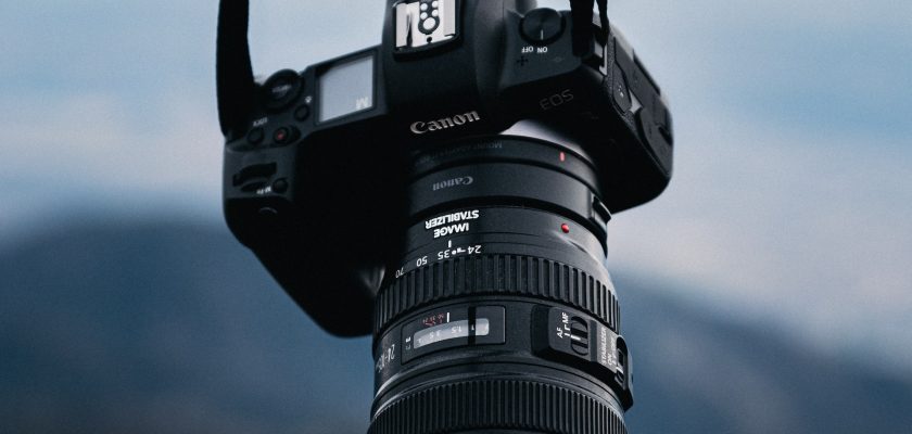 black canon camera on the natural background