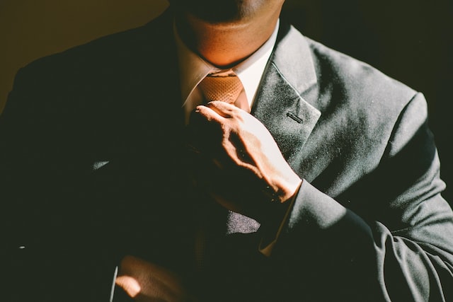 man in black suit