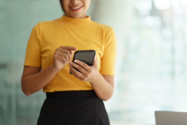 person holding the phone