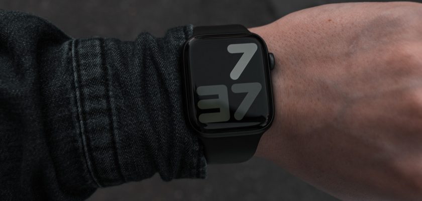 person looking at a time on apple watch