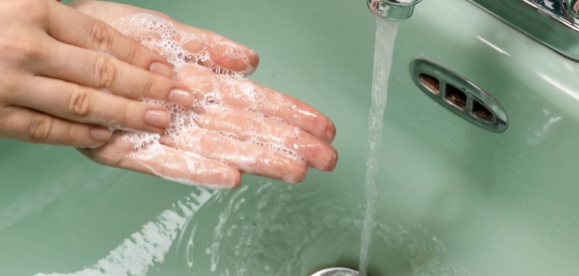 person washing hands