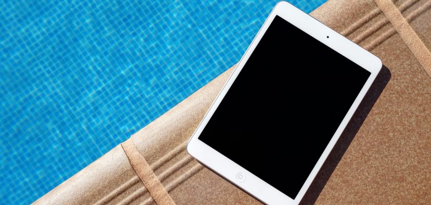 tablet near the swimming pool
